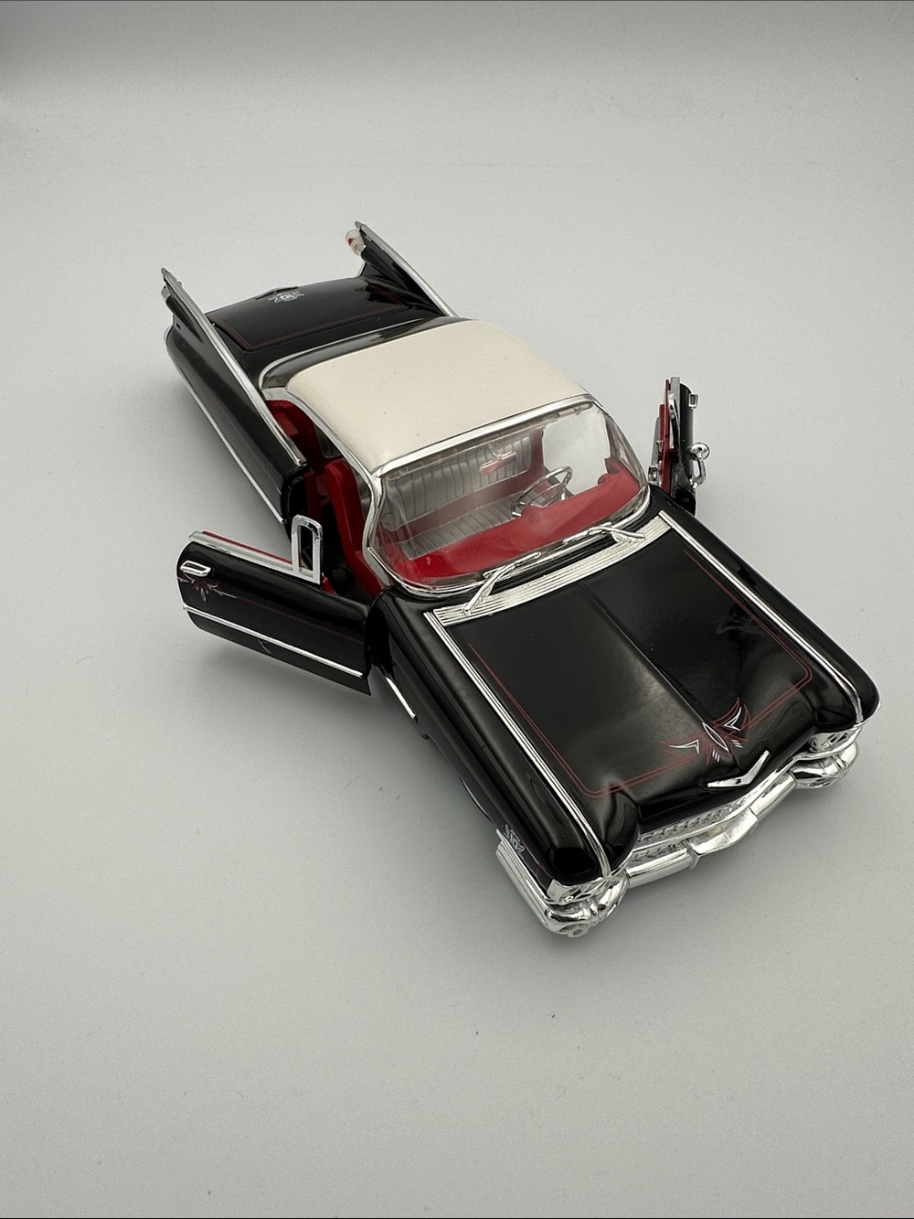 Jada Toys 1958 Cadillac Coupe Deville black diecast model toy car 1:24 Scale
